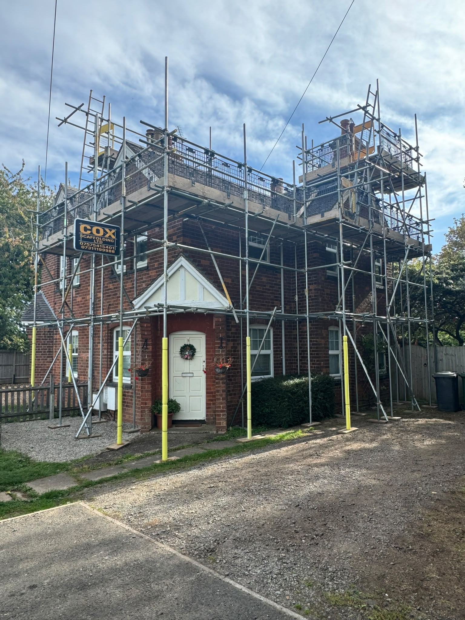 Residential scaffold hire with Cox Scaffolding branding